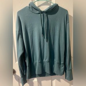 Gaiam hooded women’s top size Medium green hooded long sleeve